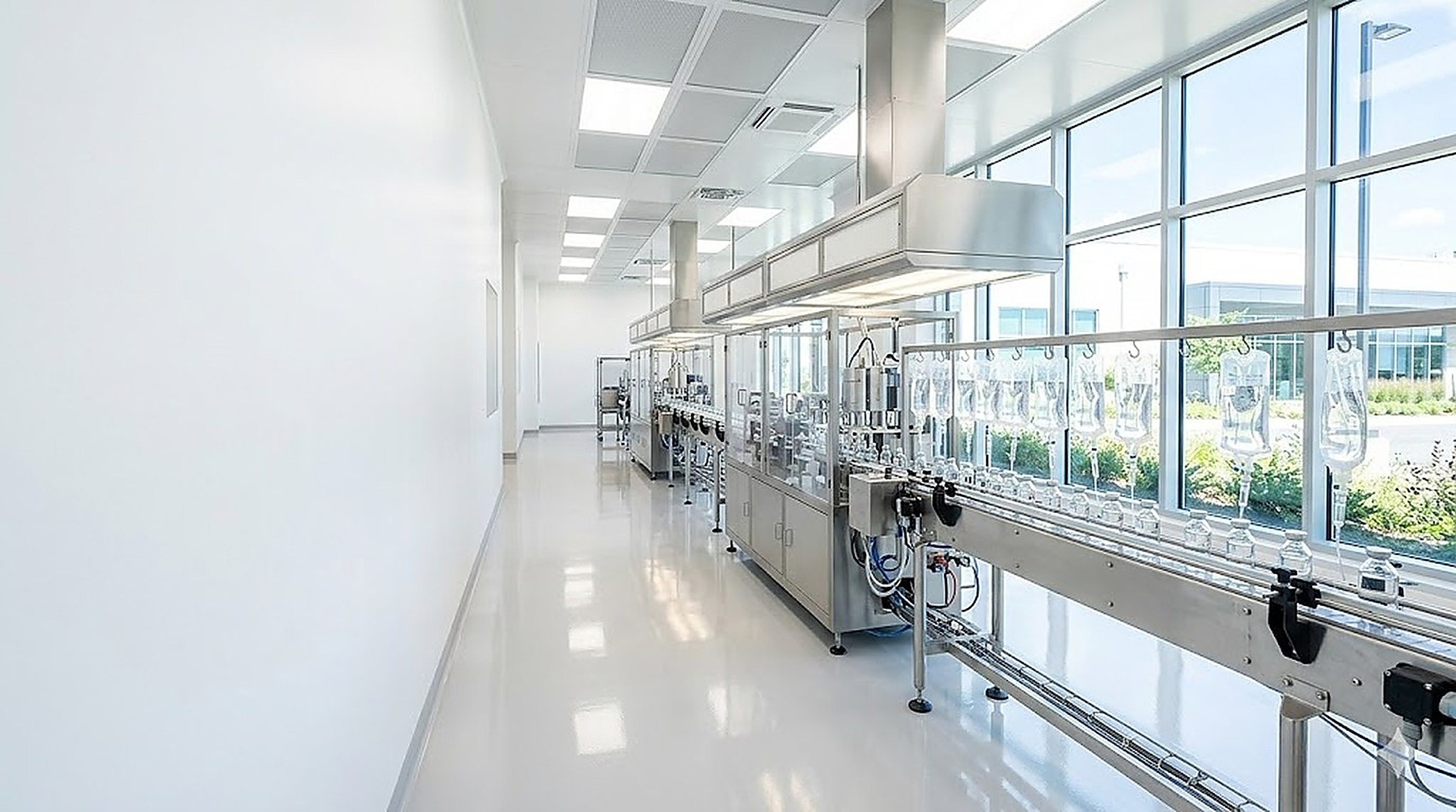 Large-volume parenteral / IV solution fill line with stainless preparation and buffer vessels, in-line membrane filtration and terminal autoclave
